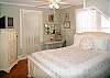 Bedroom 1 has a queen bed and Cable TV.  The soft and relaxing colors make for a great nights sleep. ( or afternoon nap....)