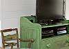 Large flatscreen TV in living room.