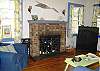The Living Room features a large screen TV with DVD and Direct TV.