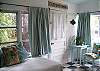 We have two twin beds- one in this area which is private and the other twin bed is in the front den area.