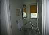 The cottage has two full bathrooms. This bathroom is in the hallway - easy access from the other two bedrooms.