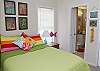 Underwater Escape is a queen bed and also has a TV.  The full bathroom is a "jack and jill" style shared bathroom with Happy Crabby bedroom. We also have games and books in our rooms to relax and enjoy.