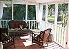 This Screen porch overlooks Ventian Drive and the marsh. Sunsets are perfection itself. We are constantly updating and improving the screen porch.  We always have lots of seating including table and chairs for dining on the porch.