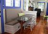The kitchen area features seating for 6 people.