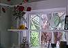 The windows in the sun room are full of wonderful treasures.
