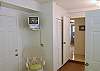 Bedroom 1 features a TV