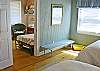 Master bedroom looking into day bed area and mini kitchen