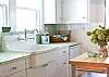 This kitchen is fully equipped AND full of cottage charm!