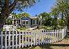 Additional views of the adorable Blue Heron Cottage; white picket fence; great location; great for pets and children!