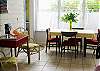 The living area also includes the dining area with seating for up to 6 people. Very bright and cheerful living space!