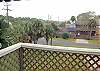 This is the small balcony and view from the master bedroom deck. This looks south on the island- ideal to see fireworks for 4th of July or New Year's Eve! Also great spot to watch one of our many parades down Butler Ave.