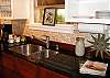 fully stocked and equipped kitchen. And if you don't have what you need, Guest Services is 24/7 and we'll bring over what you need!