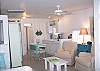 This is a true cottage with truly one big room. This is the view coming in the front door looking towards the living area and kitchn