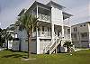 The front of the beach home. The front of the home faces east - towards the sunrise and the beach.