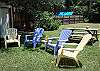 Backyard seating area and picnic table.
