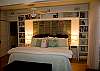 The master bedroom features a king bed and master full bathroom