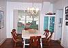 Enjoy great dinners and games at this table - in the backgound you can see the 3rd bedroom - which is a sunroom!