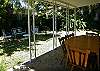We have a table and chairs underneath the carport for your outdoor eating and enjoying.