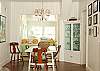 Dining room looking into the sunroom - where the two twin beds are - you can close the curtains for a little privacy when you nustle the children to bed!  There is also a full washer and dryer for your convenience!