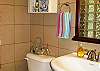 This is the bathroom of the amazing large walk in shower complete with an incredible rain forest over head shower head. You'll love this shower!