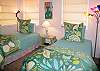 This bedroom features 2 twin beds.