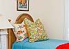 Third bedroom has two twin beds and lots of fun, beachy details! Flatscreen TV!