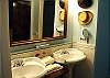 Bathroom 2 is also a full bath room with separate double sink area.This bathroom is also considered the Master bathroom and is located off the queen bedroom.