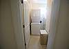 The stackable full-size washer and dryer are conveniently located on the 2nd floor with the bedrooms.