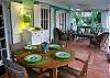 The porch is ideal for eating or just relaxing and watching the bike riders go by or the sunset over the marsh.
