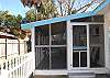 Closeup exterior view of screened porch! Great place to hang out after a day at the beach!