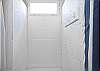 Downstairs enclosed area offers great outdoor showers; perfect for washing off that beach sand before heading indoors!