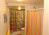 Bathroom 2 also features the laundry room with front loading washer and dryer.