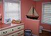 The connecting master bathroom features full bathroom with shower/tub.