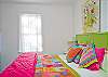 Bedroom #2 - King size bed and wonderful, bright, colorful decor!