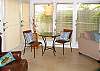 Directly off the dining room/ living room- lots of seating and the tv to enjoy.  Truly a great place to relax .