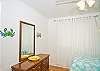 Bedroom #2 - Another room with one double and one twin bed, bright colors, a few sea creatures and local art to boot!
