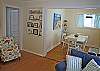 Dining room area ( leads in from the living room area. Features original art by local artists.