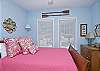 This bedroom also includes the master bath as well as a door that leads out to the screened porch.  Cable TV as well