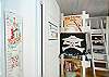 Downstairs bedroom #2.  Bunk beds on bottom; top of beds are for play; not a sleeping area.  Perfect pirate decor!
