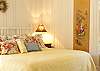 This bedroom has a comfy King bed and lots of pillows!