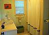 Each of the two bathrooms are full bathrooms with Tub and shower.