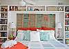 This bedroom was featured in the book "Cottages". The master bedroom has a separate full bathroom with an entrance to the backyard and private outdoor shower with hot and cold water.