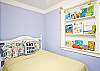 Kids bedroom with double bed.