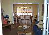 The living room leads into the dining room. Hard wood floors, cheerful beach colors everywhere in the home. Fresh and Clean!