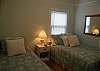 Another view of bedroom 3 with the double and twin beds.