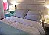 The Master Bedroom has 1 queen bed and a full bathroom.