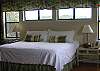 The Tahiti Suite Master Bedroom occupies  the top floor of the home and is very elegant with a  private master bathroom with Jacuzzi tub and shower.We also have a coffee maker and great views of the marsh and sunsets.