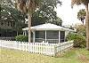 Sea Largo is a ground level cottage ideal for families or older people . Large fenced in yard surrounds the cottage.