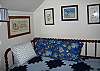 The twin bed in the Sail Away Bedroom