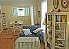 Living room area leading into the dining room